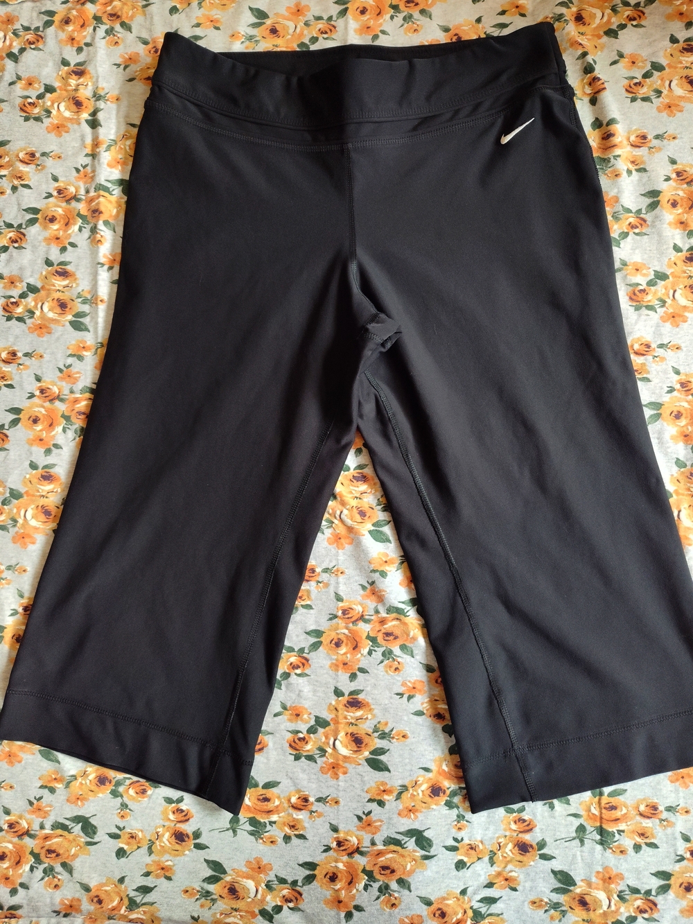 Nike Black Cropped Performance Leggings with White Swoosh